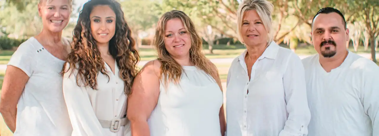 The East Lake Insurance and Taxes team outdoors